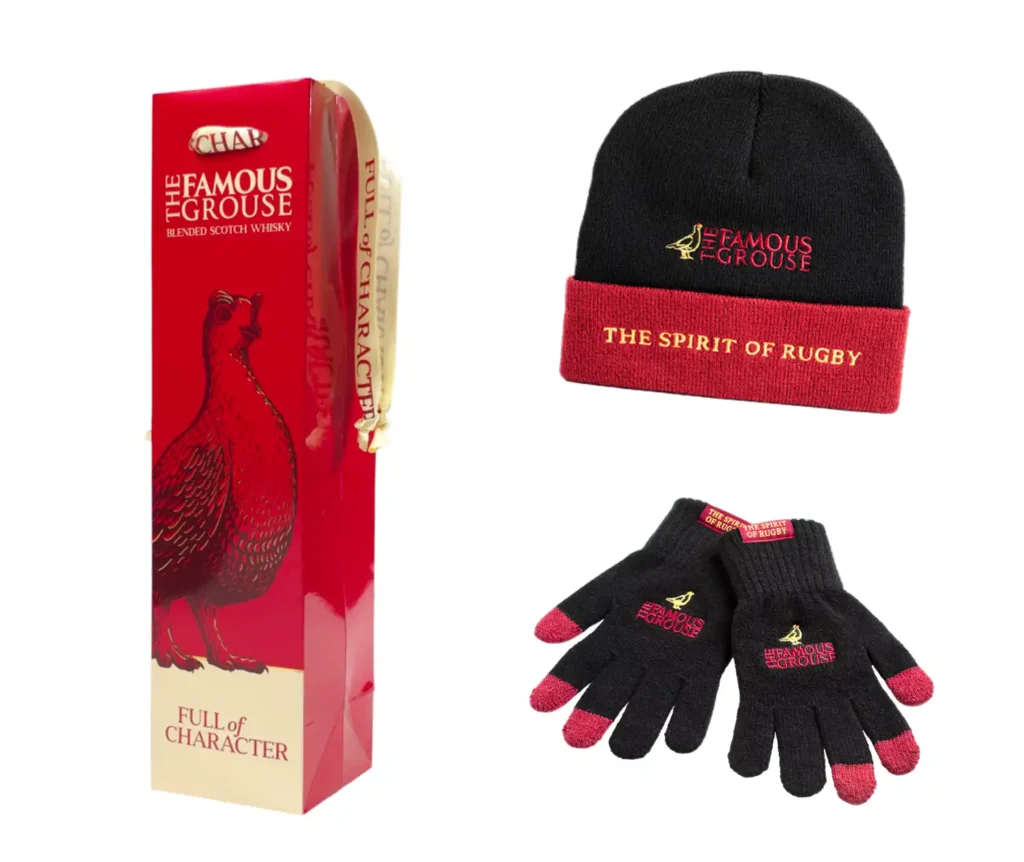 The Famous Grouse branded merchandise, including a hat, gloves and bottle bag.
